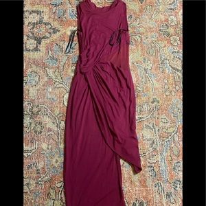 Bebe. Beautiful wine colored, asymmetrical mesh insert Bebe dress